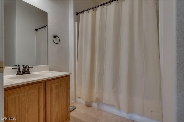 3936 Pepper Thorn Ave Unit 3, North Las Vegas, NV 89081 - full bath featuring vanity, tile patterned floors, and shower / bathtub combination with curtain