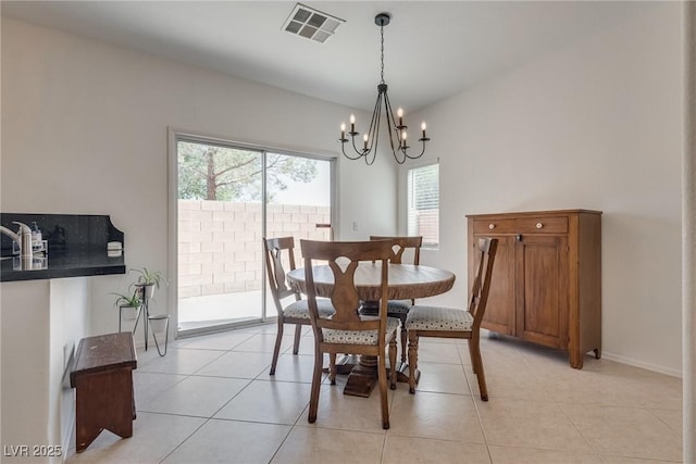 3936 Pepper Thorn Ave Unit 3, North Las Vegas, NV 89081 - dining room with a chandelier and light tile patterned floors