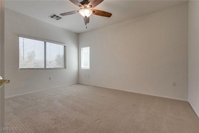 3936 Pepper Thorn Ave Unit 3, North Las Vegas, NV 89081 - spare room featuring light colored carpet and ceiling fan