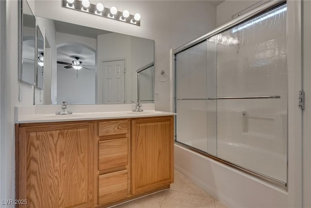 3936 Pepper Thorn Ave Unit 3, North Las Vegas, NV 89081 - bathroom featuring ceiling fan, tile patterned flooring, double vanity, and enclosed tub / shower combo