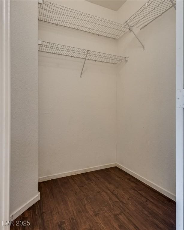 3936 Pepper Thorn Ave Unit 3, North Las Vegas, NV 89081 - spacious closet featuring dark wood-style flooring