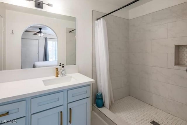 2200 S Fort Apache Rd Unit 2217, Las Vegas, NV 89117 - full bath featuring a ceiling fan, vanity, and a tile shower