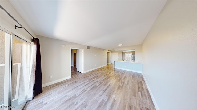 8070 W Russell Rd Unit 1046, Las Vegas, NV 89113 - unfurnished living room featuring light wood finished floors and recessed lighting