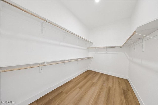 2297 Aria Dr, Henderson, NV 89052 - spacious closet with light wood-style floors