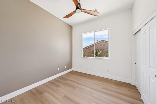 2297 Aria Dr, Henderson, NV 89052 - unfurnished bedroom featuring light wood-style flooring, a closet, and ceiling fan