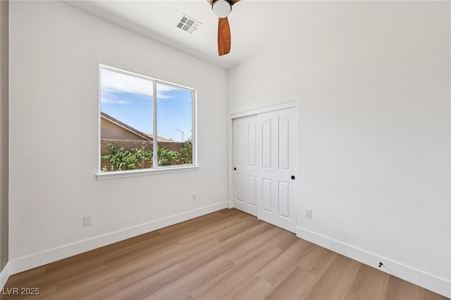 2297 Aria Dr, Henderson, NV 89052 - unfurnished bedroom featuring light wood-style flooring, a closet, and ceiling fan