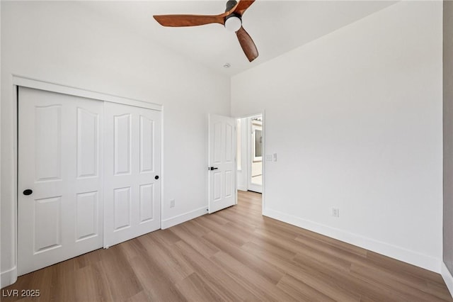 2297 Aria Dr, Henderson, NV 89052 - unfurnished bedroom featuring wood finished floors, a closet, and a ceiling fan
