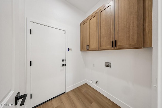 2297 Aria Dr, Henderson, NV 89052 - washroom featuring cabinet space, washer hookup, light wood-style floors, and gas dryer hookup
