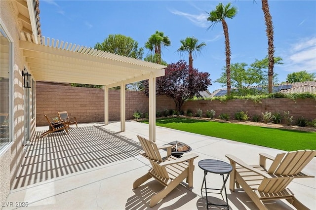 2297 Aria Dr, Henderson, NV 89052 - fenced backyard with a patio area, a pergola, and an outdoor fire pit