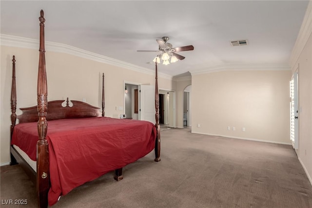 1054 Broomfield Dr, Henderson, NV 89074 - carpeted bedroom featuring arched walkways, crown molding, and a ceiling fan