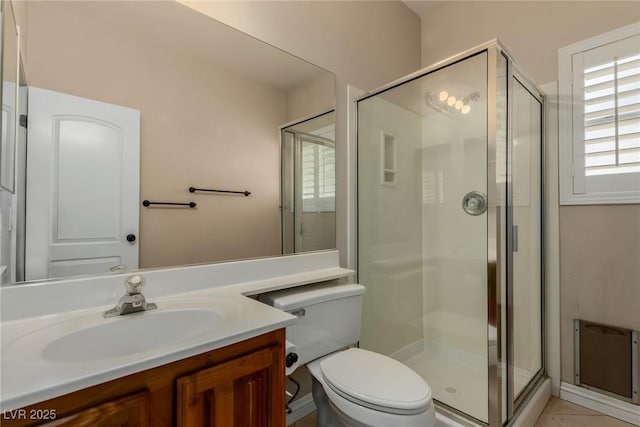 1054 Broomfield Dr, Henderson, NV 89074 - bathroom featuring a stall shower, vanity, and tile patterned flooring