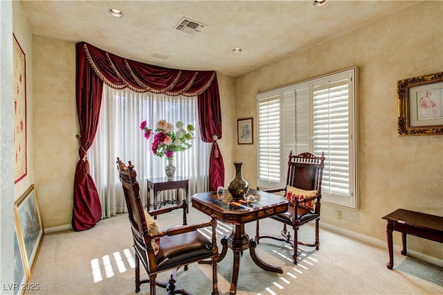 7889 Rancho Mirage Dr, Las Vegas, NV 89113 - dining space featuring light carpet, recessed lighting, and a textured wall