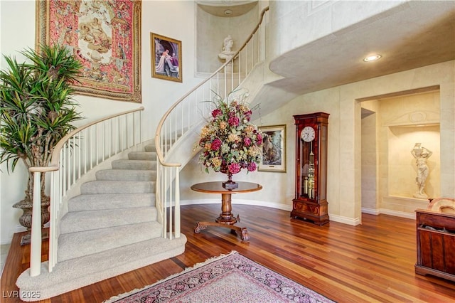 7889 Rancho Mirage Dr, Las Vegas, NV 89113 - stairs featuring wood finished floors and recessed lighting