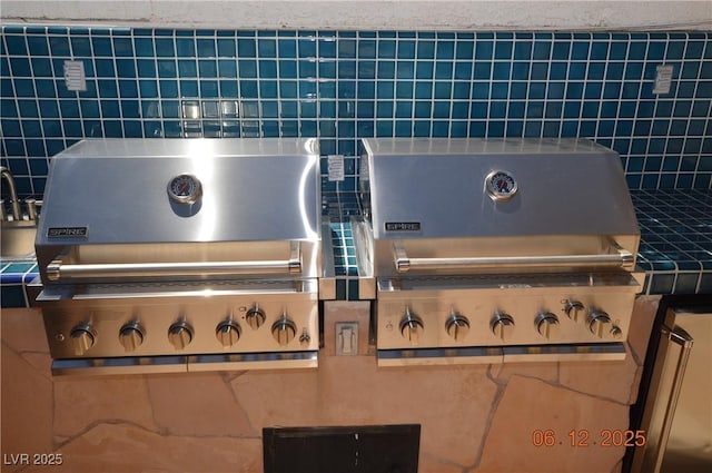 7889 Rancho Mirage Dr, Las Vegas, NV 89113 - kitchen view of pet washing station and backsplash