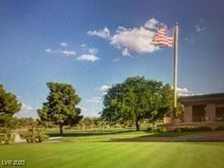 7889 Rancho Mirage Dr, Las Vegas, NV 89113 - view of home's community with a yard and view of golf course
