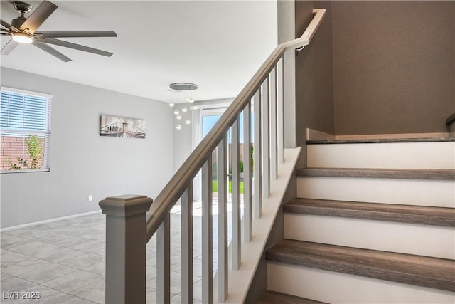 7990 Formitch Ct, Las Vegas, NV 89166 - staircase featuring healthy amount of natural light, a ceiling fan, and tile patterned flooring
