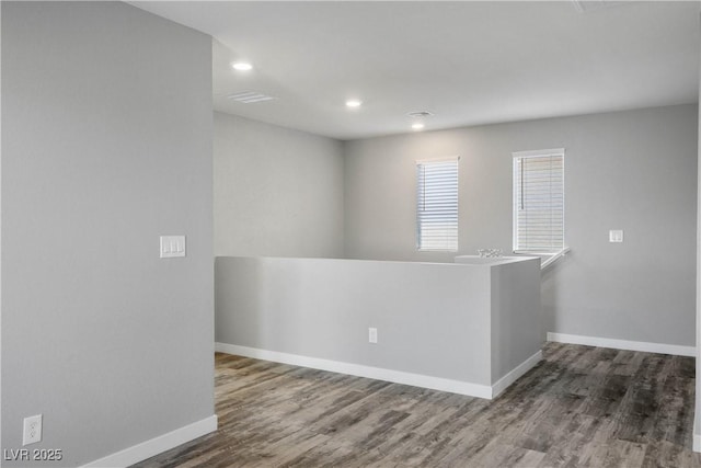 7990 Formitch Ct, Las Vegas, NV 89166 - empty room featuring wood finished floors and recessed lighting
