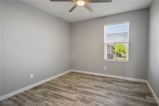 7990 Formitch Ct, Las Vegas, NV 89166 - empty room with a ceiling fan and wood finished floors