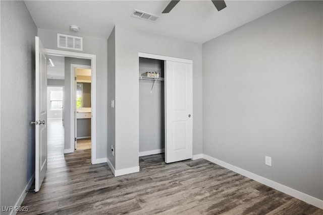 7990 Formitch Ct, Las Vegas, NV 89166 - unfurnished bedroom with wood finished floors, a closet, and ceiling fan