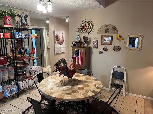 1866 Camino Verde Ln, Las Vegas, NV 89119 - dining room with light tile patterned flooring and a textured ceiling