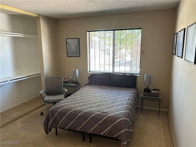 1866 Camino Verde Ln, Las Vegas, NV 89119 - bedroom featuring carpet floors and a textured ceiling