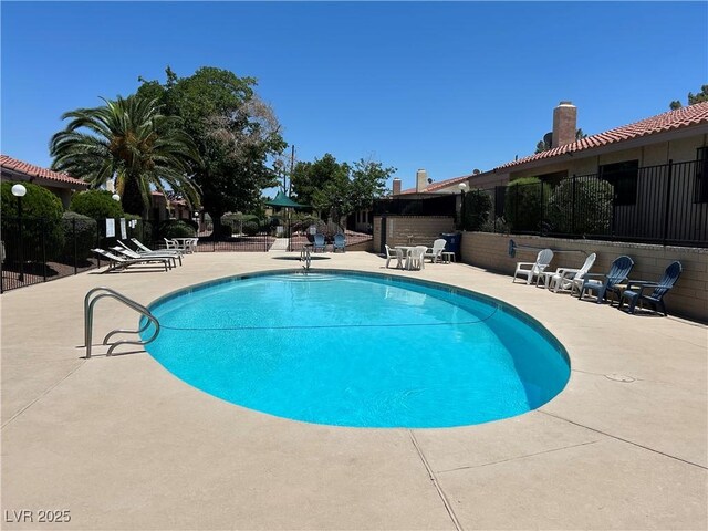 1866 Camino Verde Ln, Las Vegas, NV 89119 - community pool featuring a patio