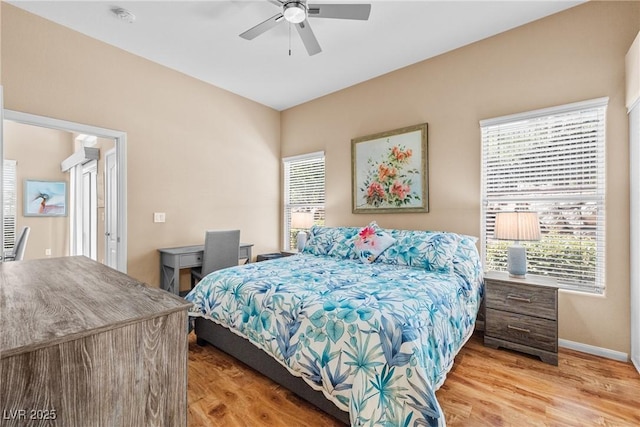 3451 Desert Cliff St Unit 103, Las Vegas, NV 89129 - bedroom with light wood-style flooring and ceiling fan