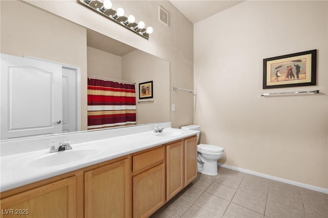 3451 Desert Cliff St Unit 103, Las Vegas, NV 89129 - bathroom with double vanity, tile patterned floors, and a shower with curtain