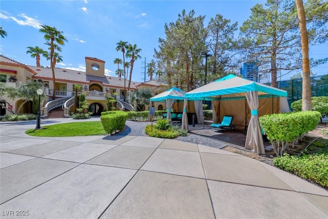 230 E Flamingo Rd Unit 229, Las Vegas, NV 89169 - view of community with stairs and a patio area