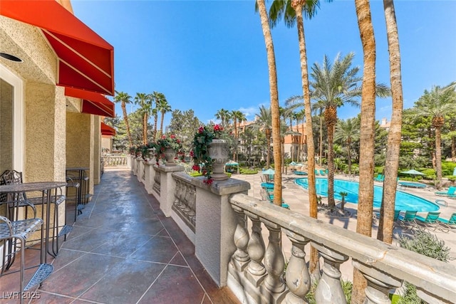 230 E Flamingo Rd Unit 229, Las Vegas, NV 89169 - view of patio / terrace featuring a community pool