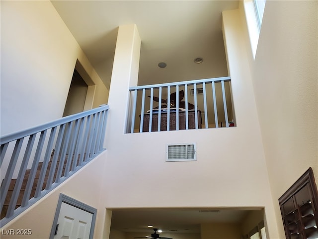 9022 Sosa Creek Ave, Las Vegas, NV 89149 - stairs featuring a high ceiling
