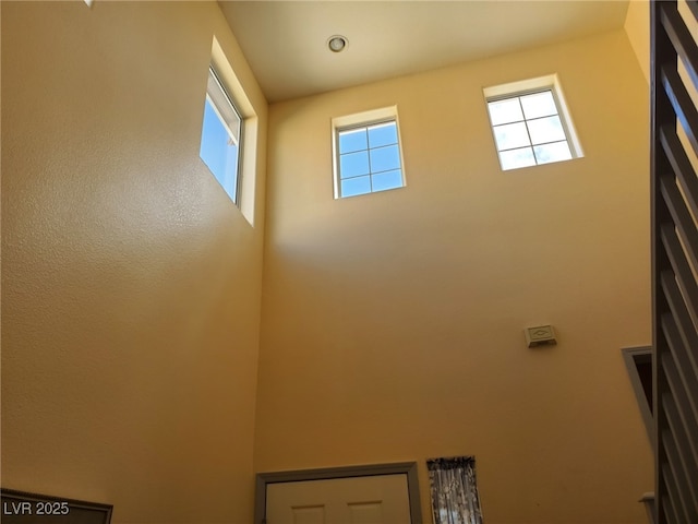 9022 Sosa Creek Ave, Las Vegas, NV 89149 - laundry room with a towering ceiling