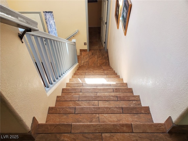 9022 Sosa Creek Ave, Las Vegas, NV 89149 - staircase with a textured wall