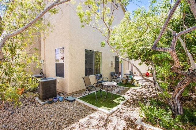 9022 Sosa Creek Ave, Las Vegas, NV 89149 - rear view of house with stucco siding and a patio area