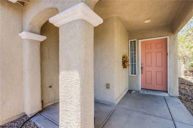 9022 Sosa Creek Ave, Las Vegas, NV 89149 - doorway to property with stucco siding