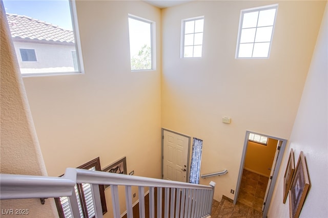 9022 Sosa Creek Ave, Las Vegas, NV 89149 - staircase featuring a high ceiling