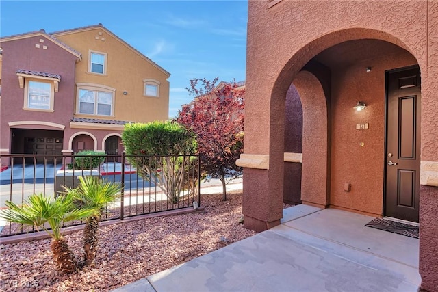3975 N Hualapai Way Unit 121, Las Vegas, NV 89129 - doorway to property with stucco siding
