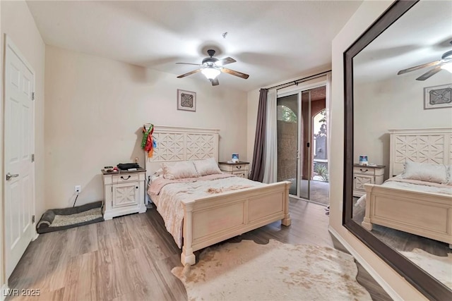 3975 N Hualapai Way Unit 121, Las Vegas, NV 89129 - bedroom featuring access to outside, light wood-style floors, and ceiling fan