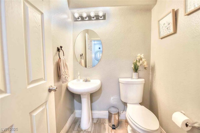 759 Sunrise Crossing St, Henderson, NV 89014 - bathroom with toilet and wood finished floors