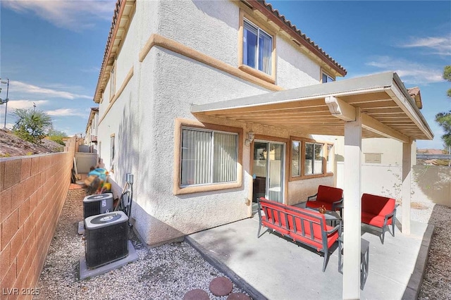 759 Sunrise Crossing St, Henderson, NV 89014 - rear view of property featuring stucco siding and a patio area