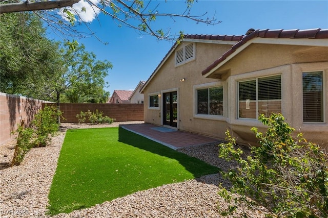 6740 Arctic Breeze St, North Las Vegas, NV 89084 - fenced backyard with a patio