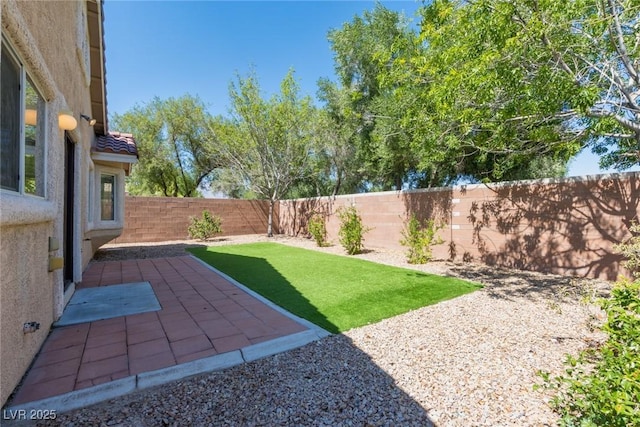 6740 Arctic Breeze St, North Las Vegas, NV 89084 - fenced backyard with a patio