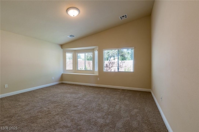 6740 Arctic Breeze St, North Las Vegas, NV 89084 - unfurnished room with lofted ceiling and carpet