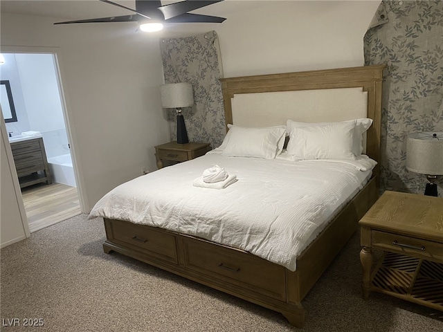 332 Dockside Ct, Las Vegas, NV 89145 - bedroom with light carpet, connected bathroom, and a ceiling fan