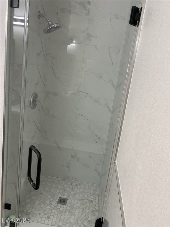 332 Dockside Ct, Las Vegas, NV 89145 - bathroom with a marble finish shower