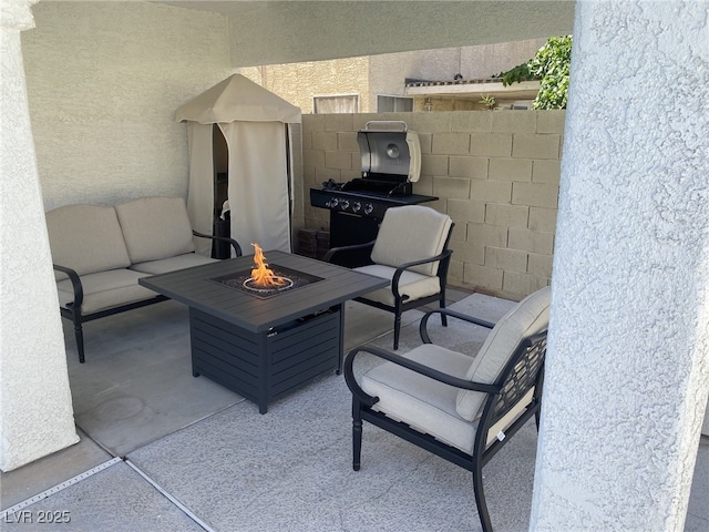332 Dockside Ct, Las Vegas, NV 89145 - view of patio / terrace featuring a fire pit