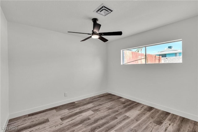 5617 Reiter Ave, Las Vegas, NV 89108 - spare room with ceiling fan and wood finished floors