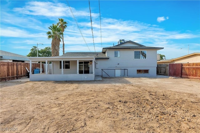 5617 Reiter Ave, Las Vegas, NV 89108 - rear view of property featuring a fenced backyard