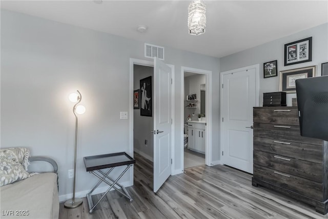2530 Catallo St, Henderson, NV 89044 - sitting room featuring light wood-style flooring and baseboards