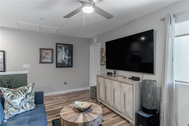 2530 Catallo St, Henderson, NV 89044 - living room featuring light wood finished floors and ceiling fan